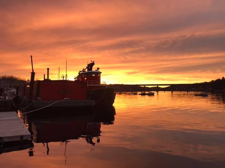 Sunset tugboats outside Nautilus in Belfast Maine